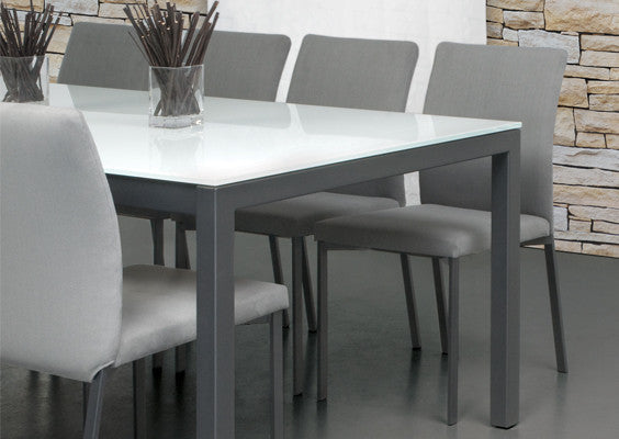 A tall slim modern dining chair that is made to order with